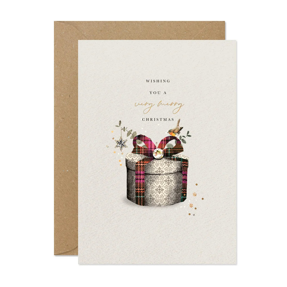 Christmas card with a gift box and plaid ribbon on a white background
