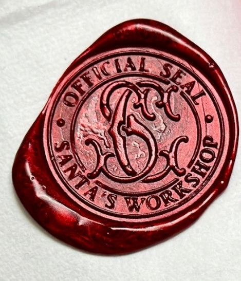 Official Santas workshop seal in red wax