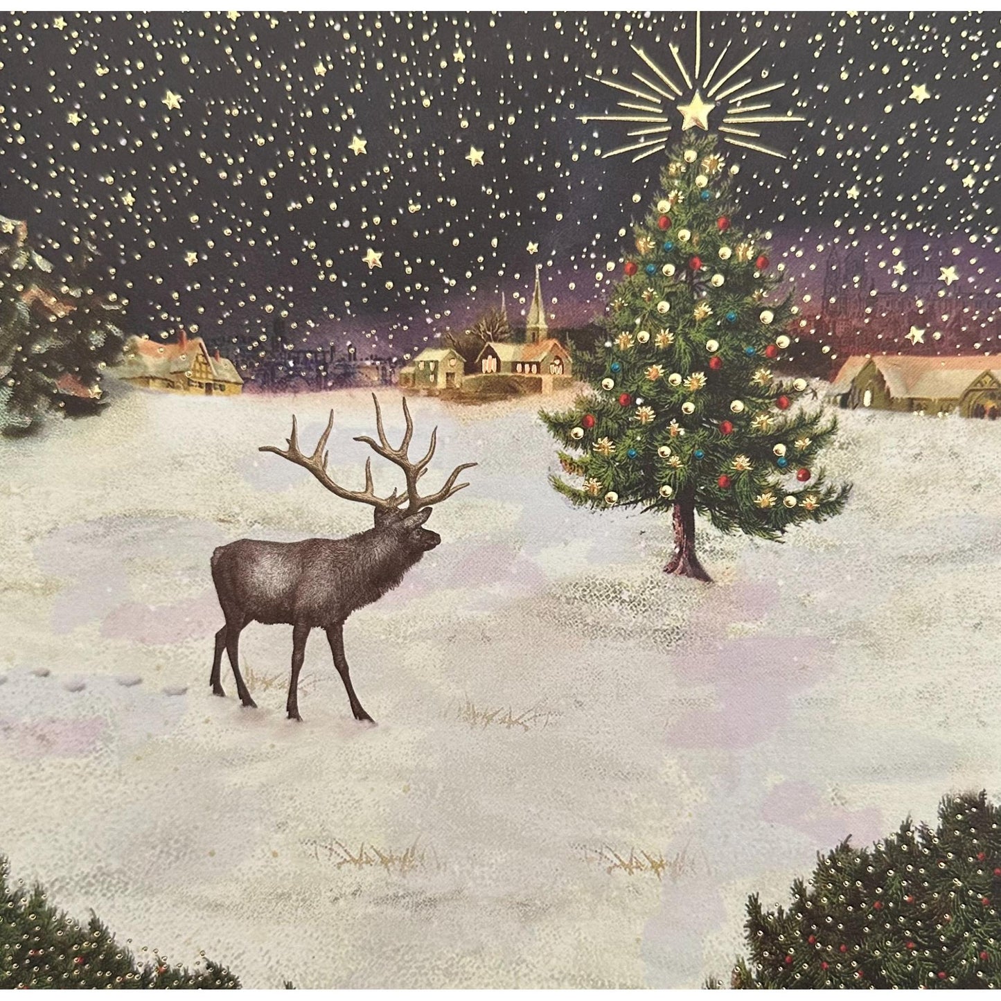 Deer standing in a snowy landscape with a decorated Christmas tree under a starry night sky.