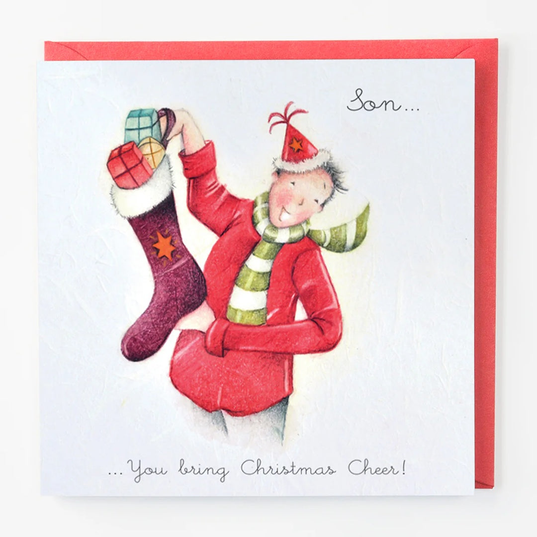 Christmas card with a person in red holding a purple stocking, wearing a Santa hat and scarf.